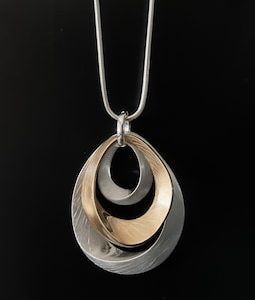 Mixed Metal Layered Oval Pendant Necklace: Modern Minimalist Jewelry
